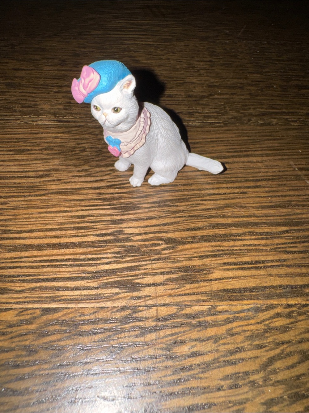 White Cat Figurine with Blue and Pink Hat